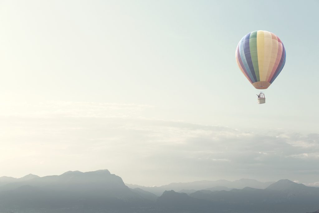 Hot-air,Balloon,Flying,In,The,Sky